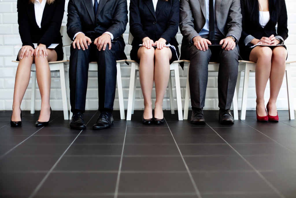 stressed business people waiting in lobby for job interview