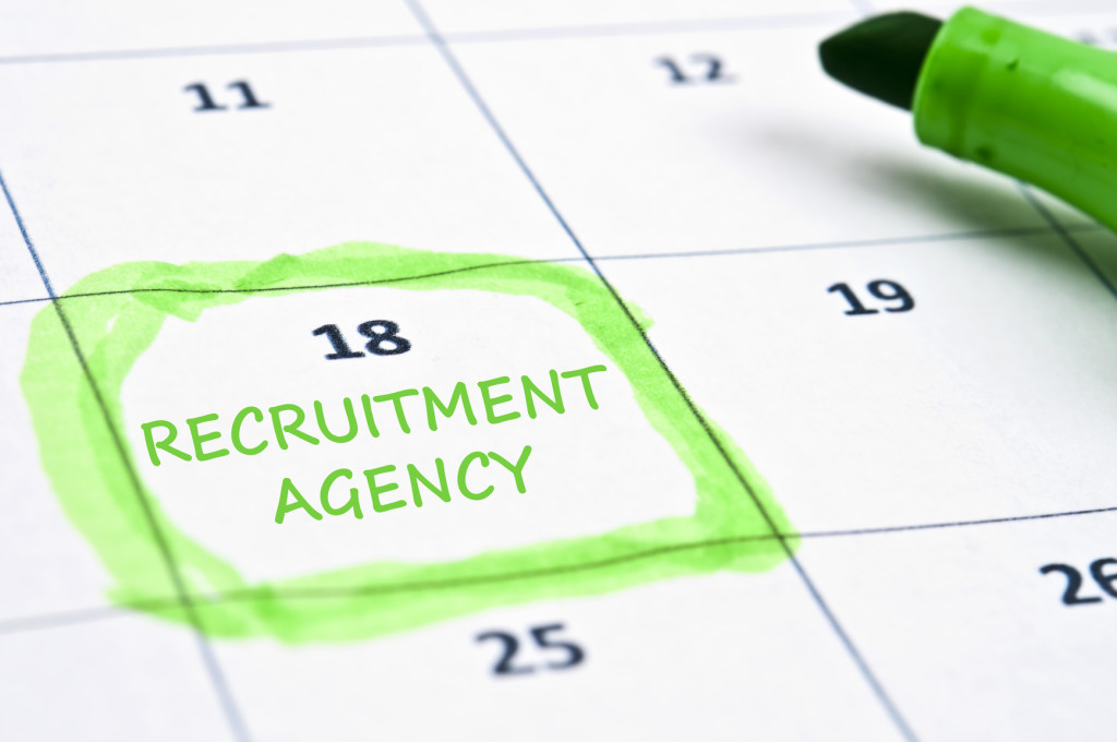 Calendar on which a date is highlighted and marked "Recruitment Agency"